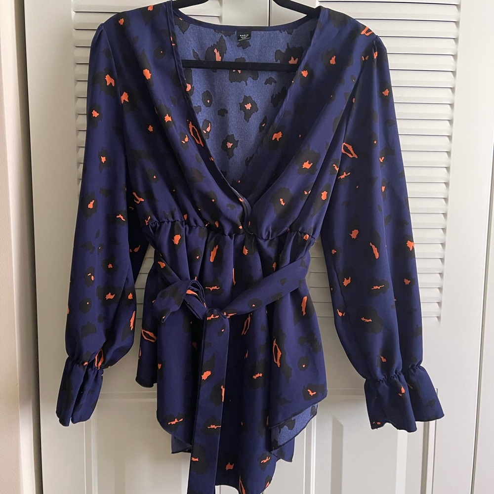 Chic Navy Wrap Blouse with Orange Accents